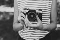 Film camera in the hands of the girl Royalty Free Stock Photo