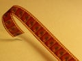 Film celluloid over a yellow background