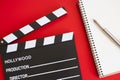 Film clapper on red background Royalty Free Stock Photo