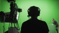 Film Crew in Green Studio Royalty Free Stock Photo