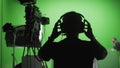 Film Crew in Green Studio Royalty Free Stock Photo