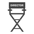Film director chair black icon. Work on the set of the film. Royalty Free Stock Photo