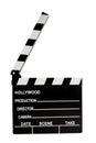 Film industry and directing a movie concept with a clapboard isolated on white with a clipping path cutout, in cinematography a Royalty Free Stock Photo