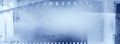 Film negatives blue background Royalty Free Stock Photo