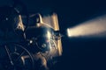Film projector with dramatic lighting Royalty Free Stock Photo
