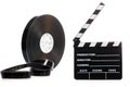 Film reel and cinema clap Royalty Free Stock Photo