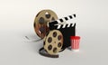 Film reel,popcorn,movie strip,disposable cup for beverages with Royalty Free Stock Photo