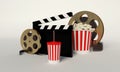 Film reel,popcorn,movie strip,disposable cup for beverages with Royalty Free Stock Photo