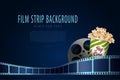 Film reel with film strips and pop corn box. Modern blue cinema background. Film template with place for your text. 3d movie art