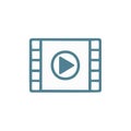Film roll icon with a play button inside, video playback symbol Royalty Free Stock Photo
