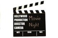 Film slate - film clapperboard. Movie Night as title Royalty Free Stock Photo