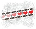 Film strip banner on spotted pattern with hearts.