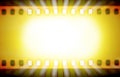 Film strips and light rays Royalty Free Stock Photo