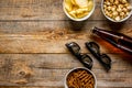 Film whatching party with beer, crumbs, chips and pop corn wooden background top view mockup