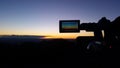 Filming Camera Viewing Mountain Sunrise