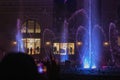 Filming on a smartphone a show of colorful beautiful musical fountains at night in Belek, horizontal