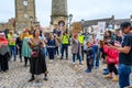 Filming a speaker at a Black Lives Matter protest on the cobbles of The Marketplace in Richmond, North Yorkshire