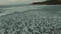 Filming the waves in the Wonderful beach, beach Vila in Imbituba, Santa Catarina, Brazil