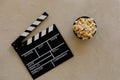 Filmmaking concept. Movie Clapperboard. Cinema begins with movie clappers. Movie clapper board on a light textural background and Royalty Free Stock Photo