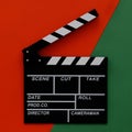 Filmmaking concept. Movie Clapperboard. Cinema begins with movie clappers. Movie clapper on a green and on a red background Royalty Free Stock Photo