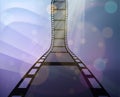 Filmstrip roll on the abstract background.