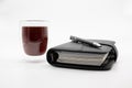 Filofax and coffee, on white background