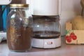 Filter coffee appliance and coffee in a jar, ready to make