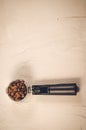 Filter holder and roasted beans coffee/Filter holder and roasted beans coffee on a concrete background. Top view and copyspace Royalty Free Stock Photo