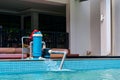 A filter pump cleans the pool water. Device for automatic cleaning of swimming pools Royalty Free Stock Photo