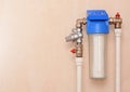 Filter system for water treatment. Installation of a reducer and a water filter for water purification. Royalty Free Stock Photo