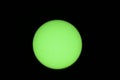 Filtered green sun Royalty Free Stock Photo