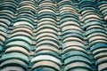 Filtered image colorful curved clay tiled roof from ancient house in the North Vietnam Royalty Free Stock Photo