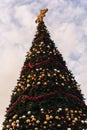 Filtered image sixty foot Christmas tree with colorful baubles and lighting display in Texas, America Royalty Free Stock Photo