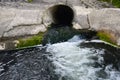Filth flowing out from sewage Royalty Free Stock Photo