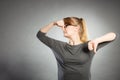 Nerdy girl holding nose. Royalty Free Stock Photo