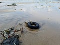 Pollution on Mumbai Versova beach endangering marine life Royalty Free Stock Photo