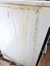 Filthy Drity and Greasy Old Fridge Ready to be Cleaned