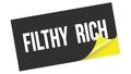 FILTHY RICH text on black yellow sticker stamp