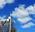 Final lap flag and clouds Royalty Free Stock Photo