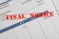 Final notice stamp on an overdue bill statement Royalty Free Stock Photo