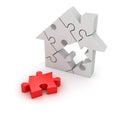 Final piece of house puzzle Royalty Free Stock Photo