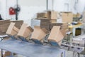 empty boxes at factory packing line Royalty Free Stock Photo