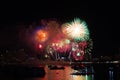 final rainbow fireworks on beach and reflection color on water surface Royalty Free Stock Photo