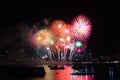 final rainbow fireworks on beach and reflection color on water surface Royalty Free Stock Photo