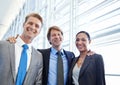 Finally reaping the rewards of their hard work. A group of happy businesspeople standing together. Royalty Free Stock Photo