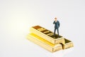 Finance asset, investment and wealth management concept, miniature people figure businessman with tie standing and thinking on sh Royalty Free Stock Photo