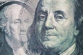 Finance background. Combined image of Benjamin Franklin and George Washington portraits on the US 100 and 1 dollar bill. Macro