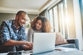 Finance, budget and ebanking couple working on laptop looking happy and hopeful about savings, investment and insurance