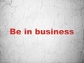 Finance concept: Be in business on wall background Royalty Free Stock Photo