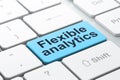 Finance concept: Flexible Analytics on computer keyboard background